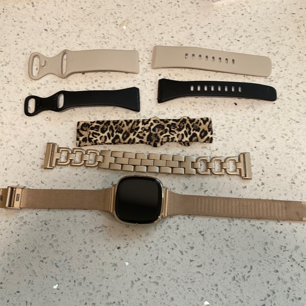 Fitbit Sense Lunar white/Soft Gold stainless Steel,barely used,with charger.